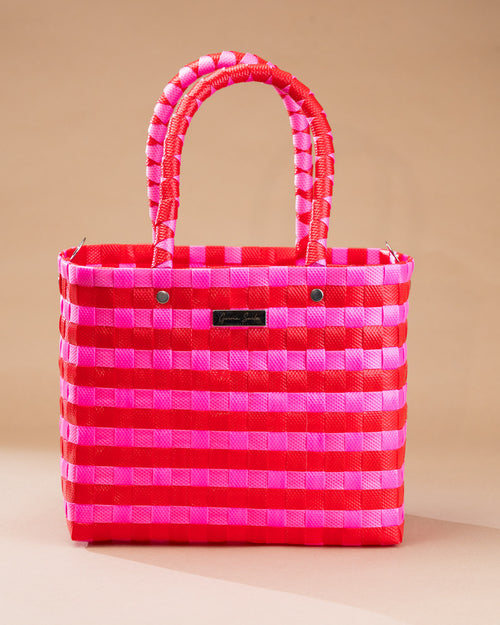 Cartera Josefina tejida a mano en fucsia y rojo