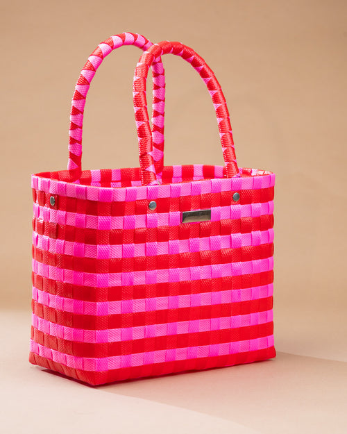 Cartera Josefina tejida a mano en fucsia y rojo
