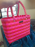 Cartera Josefina tejida a mano en fucsia y rojo