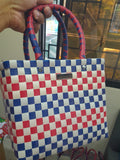 Cartera Nieves tejida a mano en azul, rojo y blanco